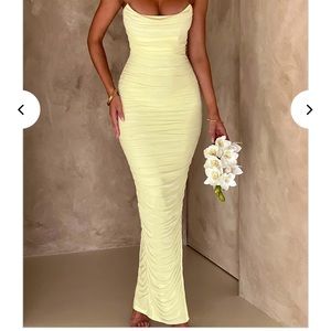 Yellow Dress. Has a slit